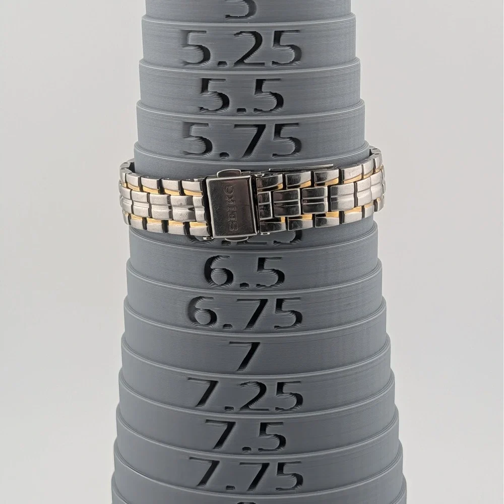 Seiko 7N82-0AG0 Blue Sunburst Two Tone Date Quartz Watch 50M‎